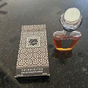 1988 Cher Uninhibited Eau De Toilette Spray in box